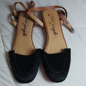 Free People Black and Tan Sandals Sleek Minimalist Design